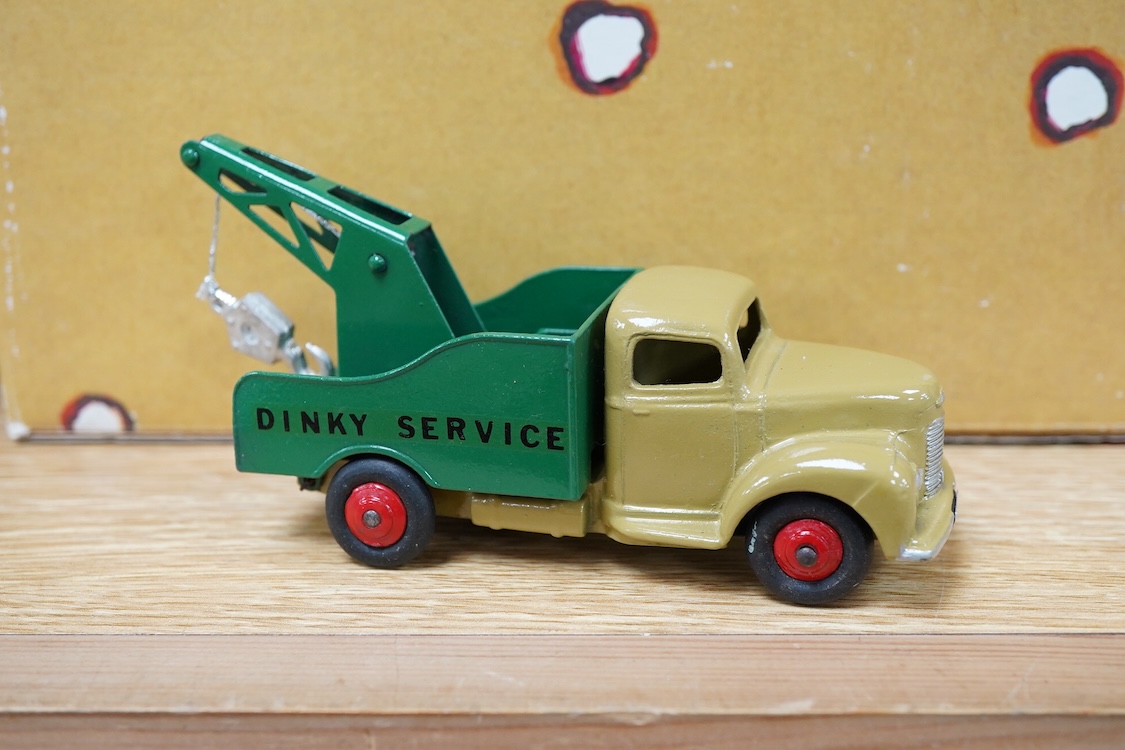 Twenty-seven Dinky Toys, all well-restored and fully repainted examples, fifteen with reproduction boxes, including; AA Mini van, Trojan van, Humber Hawk, Wayne school bus, A.C. Aceca, Austin Atlantic, Sunbeam Alpine, et